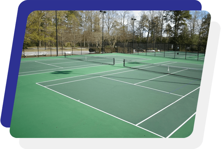 A tennis court with many players on it